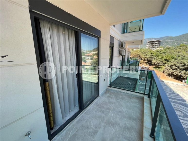 Furnished two-room apartment with an area of 47 m2. Oba district.-id-1255-photo-24