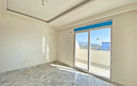 View penthouse 4+1 large area with sea views, in a new house, at an attractive price, Payallar, Alanya-id-2885-photo-11