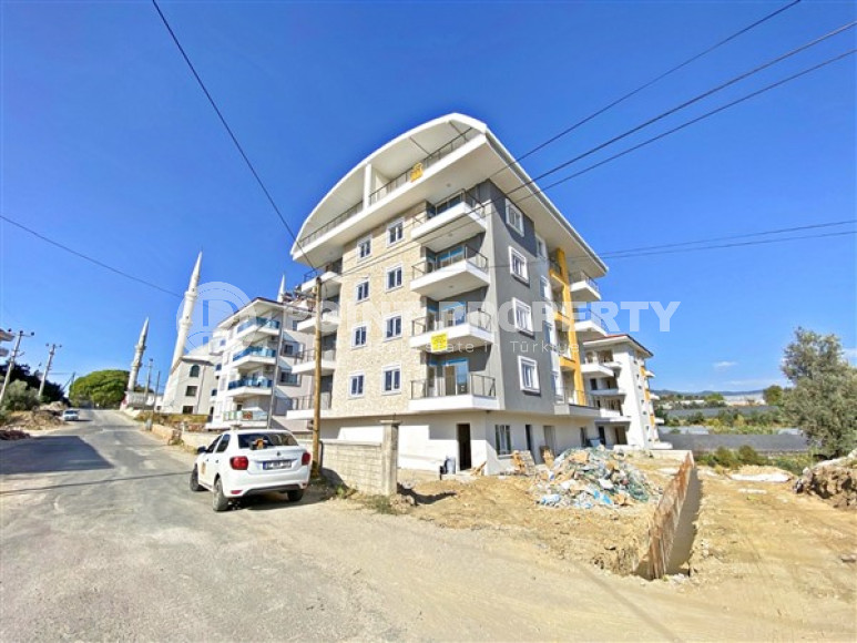 View penthouse 4+1 large area with sea views, in a new house, at an attractive price, Payallar, Alanya-id-2885-photo-32