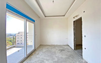 View penthouse 4+1 large area with sea views, in a new house, at an attractive price, Payallar, Alanya-id-2885-photo-33
