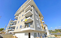 View penthouse 4+1 large area with sea views, in a new house, at an attractive price, Payallar, Alanya-id-2885-photo-34