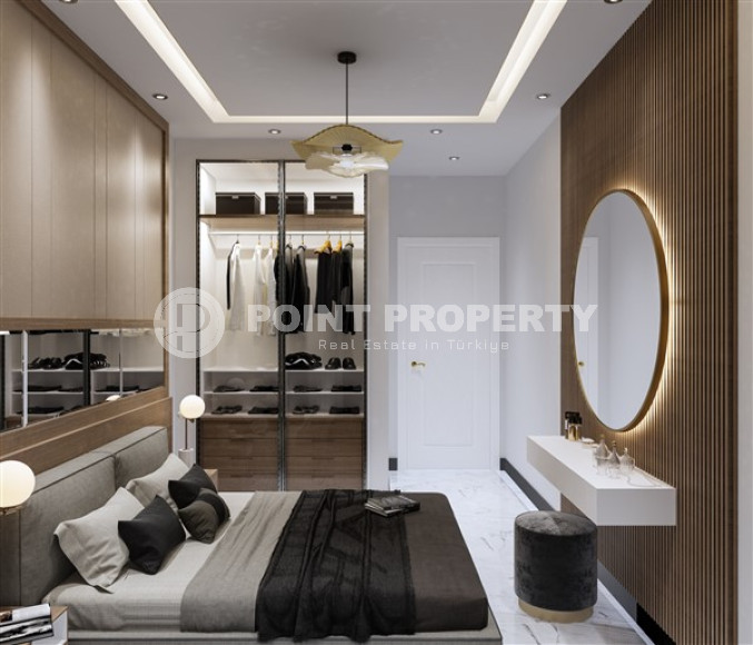 Недорогая квартира небольшой площадью 45 м2 в строящемся комплексе (июнь 2023 года) в районе Оба, Аланья-id-2890-фото-2