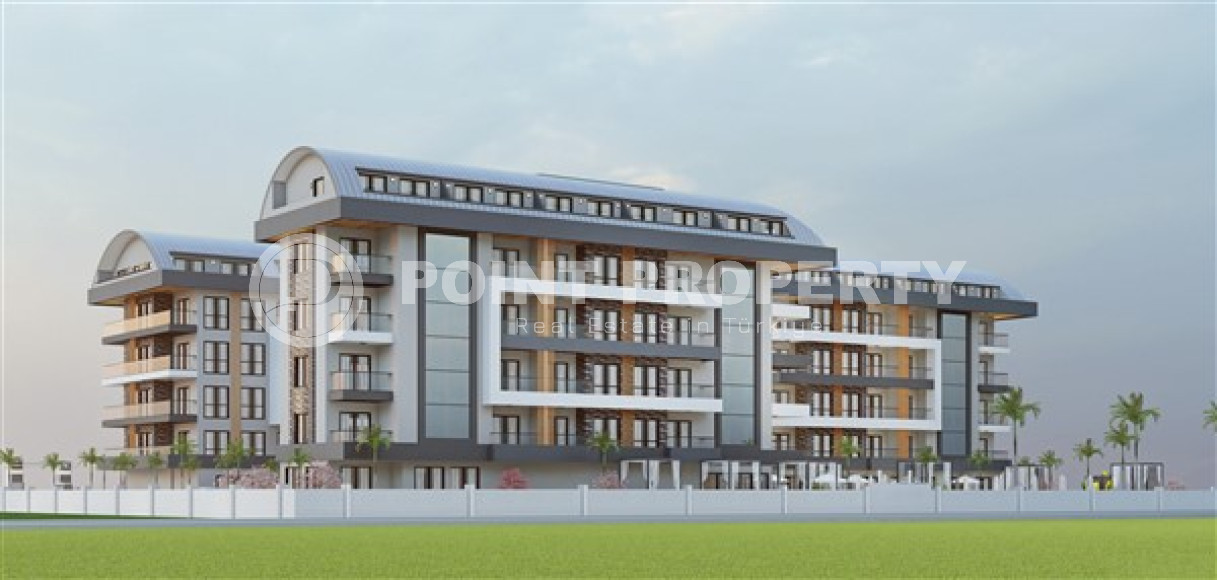 Недорогая квартира небольшой площадью 45 м2 в строящемся комплексе (июнь 2023 года) в районе Оба, Аланья-id-2890-фото-9