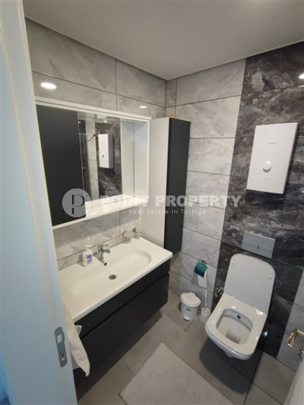 Прекрасная квартира 1+1  в 850 метрах от моря в комплексе из 2 блоков, в районе Махмутлар, Аланья-id-2937-фото-4