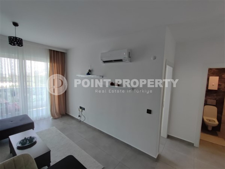 Прекрасная квартира 1+1  в 850 метрах от моря в комплексе из 2 блоков, в районе Махмутлар, Аланья-id-2937-фото-5