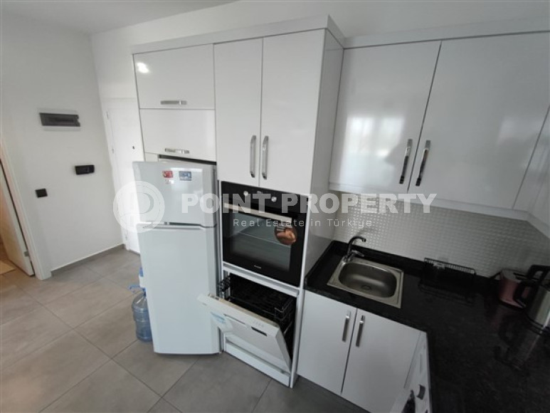 Прекрасная квартира 1+1  в 850 метрах от моря в комплексе из 2 блоков, в районе Махмутлар, Аланья-id-2937-фото-11