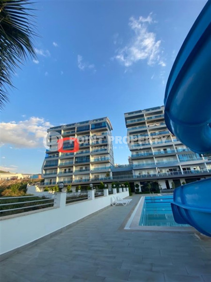 Прекрасная квартира 1+1  в 850 метрах от моря в комплексе из 2 блоков, в районе Махмутлар, Аланья-id-2937-фото-12