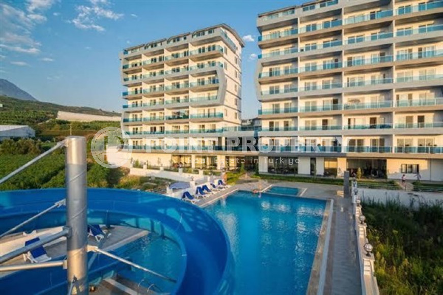 Прекрасная квартира 1+1  в 850 метрах от моря в комплексе из 2 блоков, в районе Махмутлар, Аланья-id-2937-фото-27