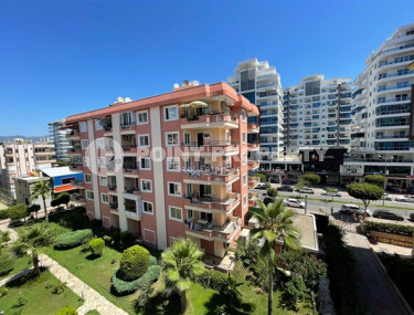 Three-room apartment 2+1 with expensive renovation on the first coastline, Mahmutlar, Alanya-id-2946-photo-1