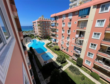 Three-room apartment 2+1 with expensive renovation on the first coastline, Mahmutlar, Alanya-id-2946-photo-2