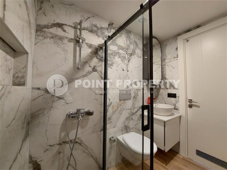 Современная двухкомнатная квартира 65 м2, центр Аланьи, в строящемся комплексе с роскошной отельной инфраструктурой-id-2944-фото-14