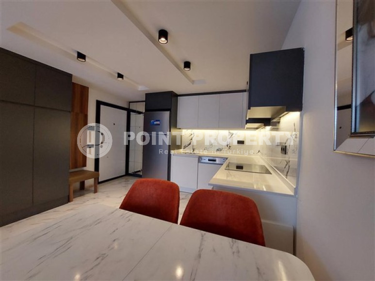 Современная двухкомнатная квартира 65 м2, центр Аланьи, в строящемся комплексе с роскошной отельной инфраструктурой-id-2944-фото-19