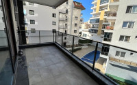 Удобная трёхкомнатная квартира 120 м² с отдельной кухней, в районе Махмутлар, Аланья-id-2953-фото-34