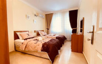 Large furnished three-room apartment, 130m², in a cozy complex on the first line in Mahmutlar-id-1262-photo-5