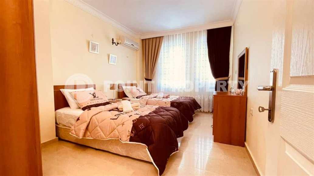 Large furnished three-room apartment, 130m², in a cozy complex on the first line in Mahmutlar-id-1262-photo-5