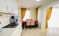 Large furnished three-room apartment, 130m², in a cozy complex on the first line in Mahmutlar-id-1262-photo-6