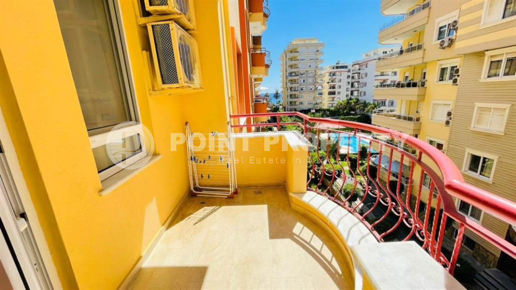 Large furnished three-room apartment, 130m², in a cozy complex on the first line in Mahmutlar-id-1262-photo-13