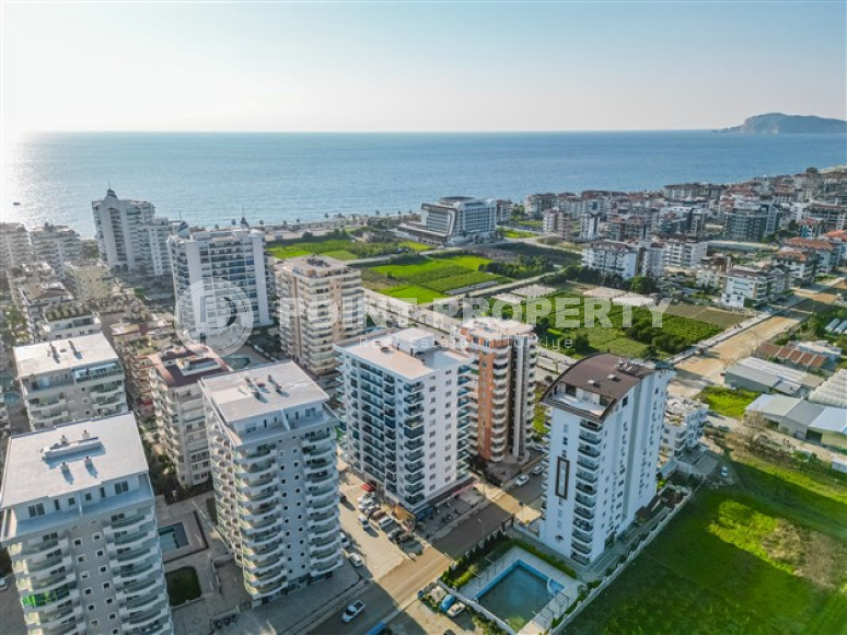 Comfortable apartment 500 meters from the sea with an area of 115 m2 in the Mahmutlar area, Alanya-id-2967-photo-3