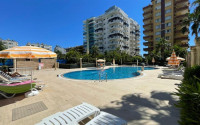 Large furnished three-room apartment, 130m², in a cozy complex on the first line in Mahmutlar-id-1262-photo-16