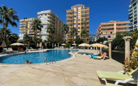 Large furnished three-room apartment, 130m², in a cozy complex on the first line in Mahmutlar-id-1262-photo-18