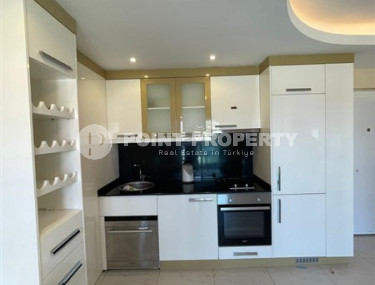 Apartment 1+1, area 42 m², with furniture and household appliances in an elite residence near Cleopatra Beach, Alanya-id-1264-photo-2