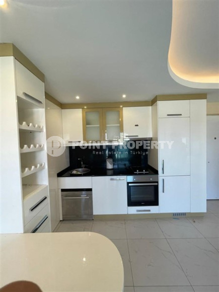 Apartment 1+1, area 42 m², with furniture and household appliances in an elite residence near Cleopatra Beach, Alanya-id-1264-photo-2