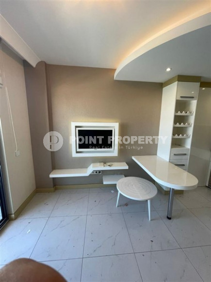 Apartment 1+1, area 42 m², with furniture and household appliances in an elite residence near Cleopatra Beach, Alanya-id-1264-photo-3