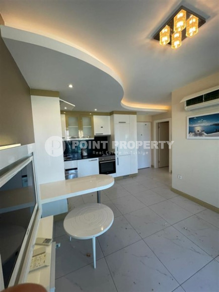 Apartment 1+1, area 42 m², with furniture and household appliances in an elite residence near Cleopatra Beach, Alanya-id-1264-photo-4