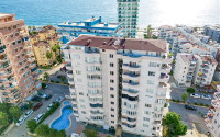 Апартаменты с большими комнатами 2+1 на 7 этаже комплекса на второй линии от моря, Махмутлар, Аланья-id-2981-фото-1