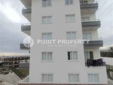 Двухуровневая квартира с собственной террасой и отдельной кухней, в новом доме, Конаклы, Аланья-id-3006-фото-3