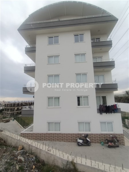 Двухуровневая квартира с собственной террасой и отдельной кухней, в новом доме, Конаклы, Аланья-id-3006-фото-3