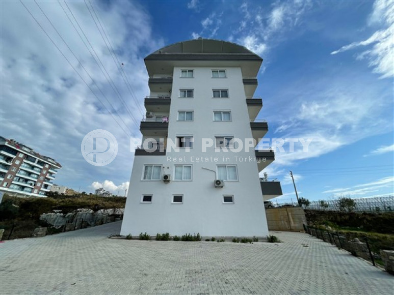 Двухуровневая квартира с собственной террасой и отдельной кухней, в новом доме, Конаклы, Аланья-id-3006-фото-6