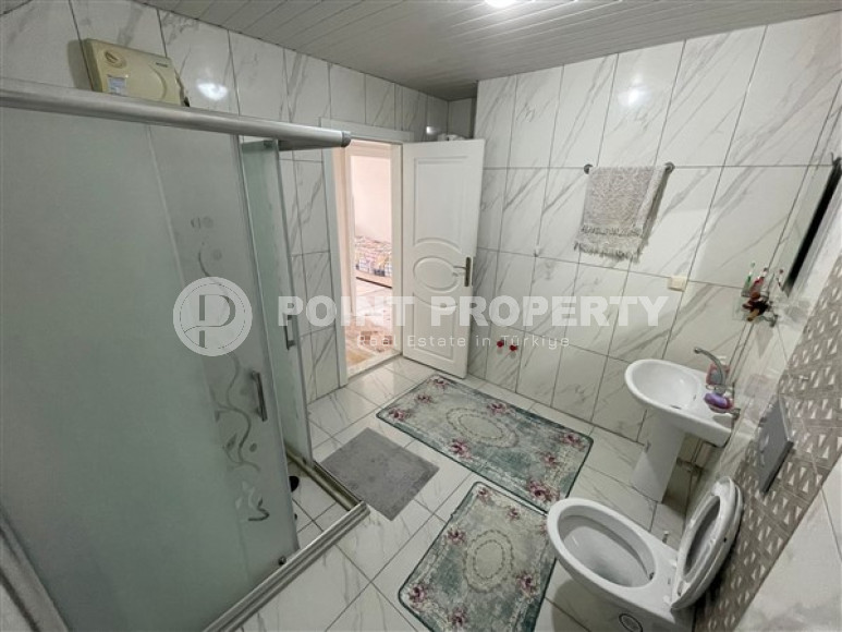 Двухуровневая квартира с собственной террасой и отдельной кухней, в новом доме, Конаклы, Аланья-id-3006-фото-24