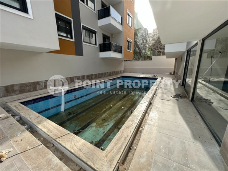 Стандартные апартаменты 1+1 по удачной цене в районе Хаджет, центр Аланьи-id-3010-фото-2