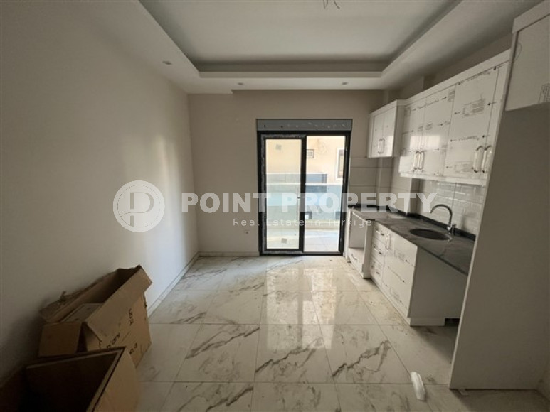 Стандартные апартаменты 1+1 по удачной цене в районе Хаджет, центр Аланьи-id-3010-фото-4