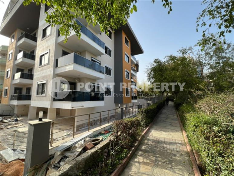 Стандартные апартаменты 1+1 по удачной цене в районе Хаджет, центр Аланьи-id-3010-фото-10