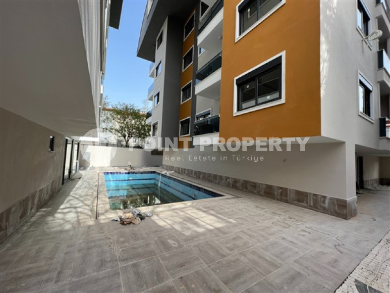 Стандартные апартаменты 1+1 по удачной цене в районе Хаджет, центр Аланьи-id-3010-фото-11