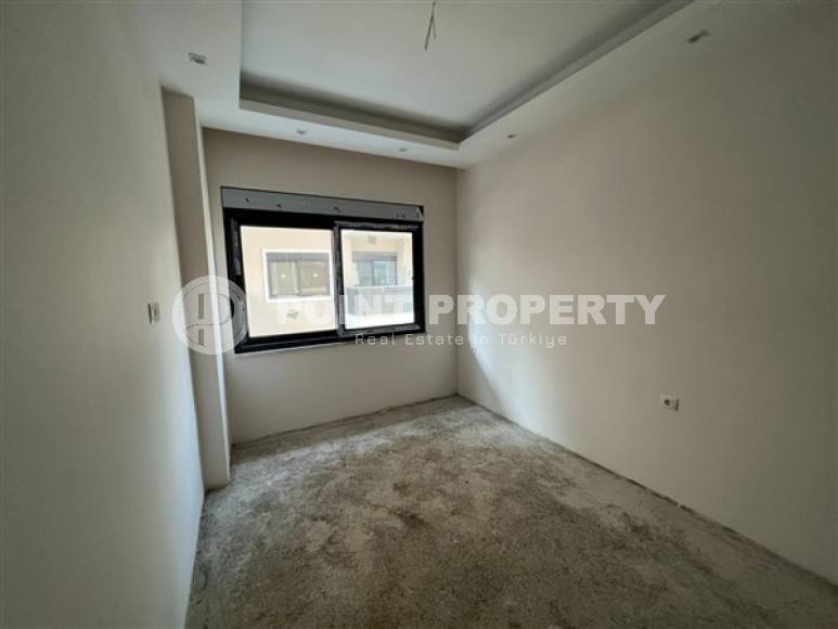 Стандартные апартаменты 1+1 по удачной цене в районе Хаджет, центр Аланьи-id-3010-фото-12