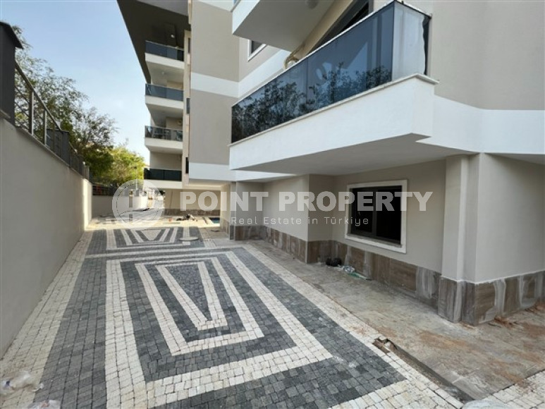 Стандартные апартаменты 1+1 по удачной цене в районе Хаджет, центр Аланьи-id-3010-фото-13