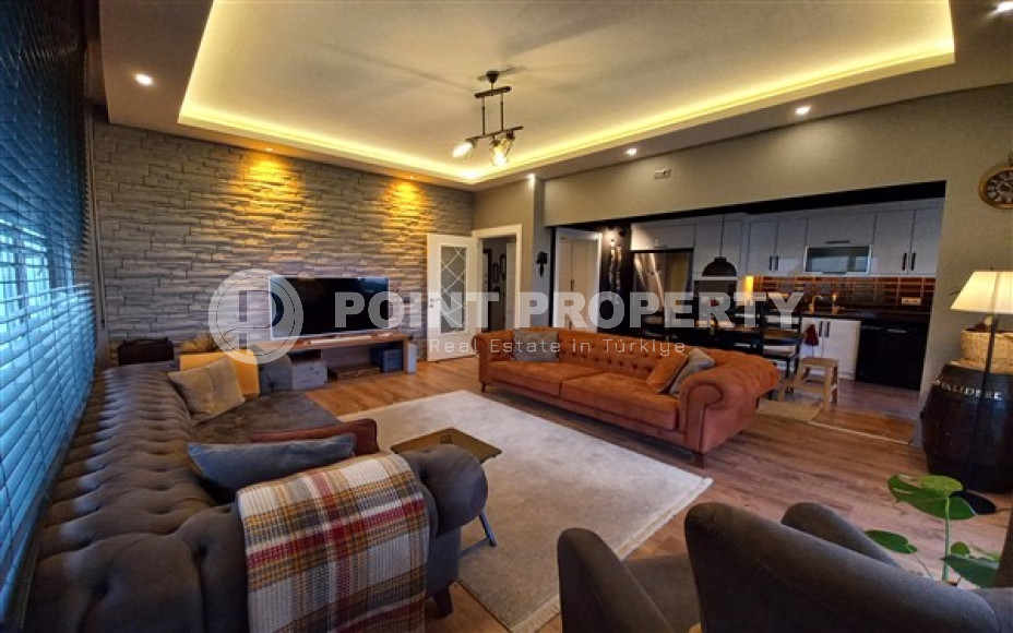Four-room apartment with luxurious renovation and access to a private garden, in the Hasbahce area, the center of Alanya-id-3018-photo-1