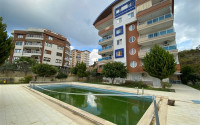 Classic 1+1 apartment at a low price, Avsallar, Alanya, in the complex 2022-id-3037-photo-1