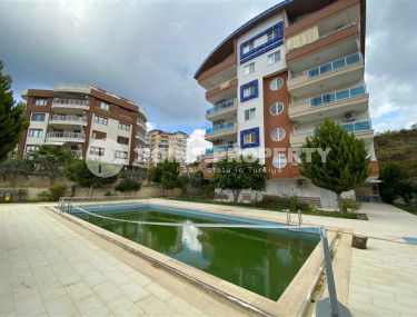 Classic 1+1 apartment at a low price, Avsallar, Alanya, in the complex 2022-id-3037-photo-1