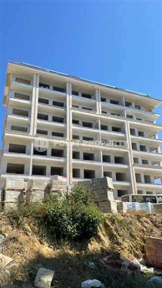 New 1+1 apartment of standard size in a house at the final stage of construction, Avsallar, Alanya-id-3047-photo-2