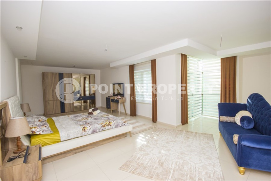 Garden duplex 4+1 with an area of 225 m2 in the Kestel area, just 350 meters from the sea-id-1269-photo-52