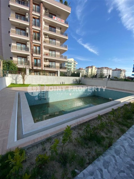 Квартира 1+1 с видом на море в новом комплексе 2022 года, в элитном районе Кестель, всего в 500 метрах от моря.-id-1270-фото-10