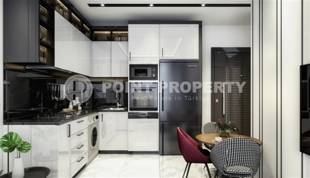 Two-room apartment 45 m2 in a luxury complex under construction in the center of Alanya, Hasbahce-id-3073-photo-14