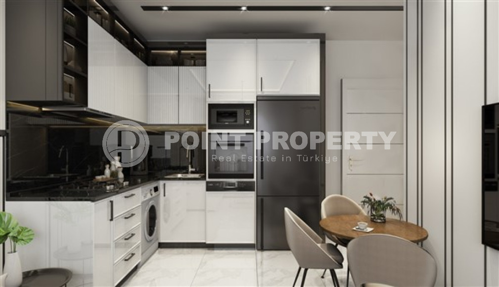 Two-room apartment 45 m2 in a luxury complex under construction in the center of Alanya, Hasbahce-id-3073-photo-15