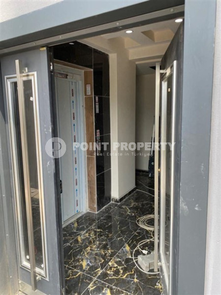 Inexpensive apartment 70 m2 with two rooms in a house built in 2022, Gazipasa-id-3074-photo-2