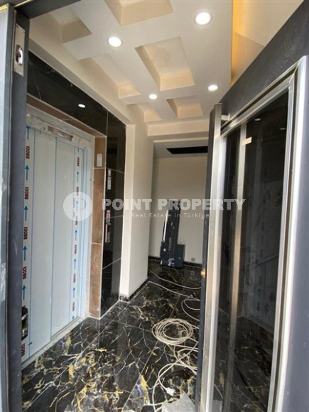 Inexpensive apartment 70 m2 with two rooms in a house built in 2022, Gazipasa-id-3074-photo-8