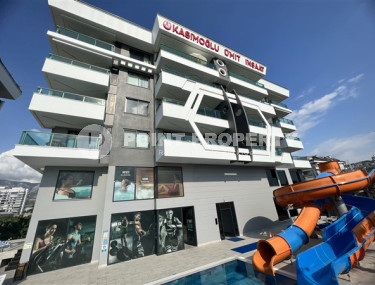 Вместительные апартаменты 2+1 в районе Каргыджак, Аланья в малоэтажном комплексе-id-3081-фото-2